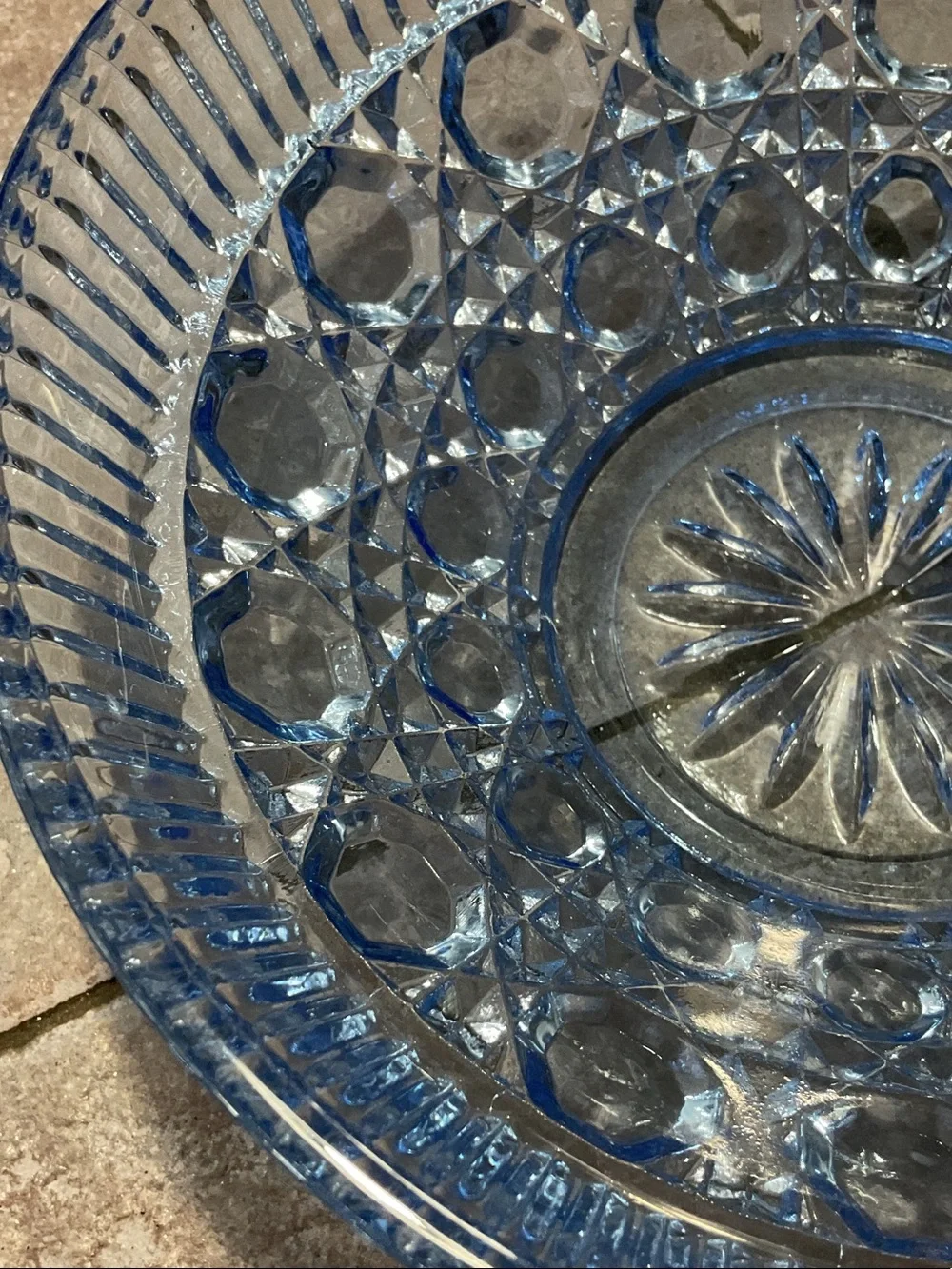 Windsor blue glass button and cane pattern.
